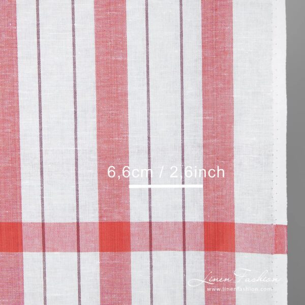 Narrow white linen cotton fabric with red stripes detail close up view