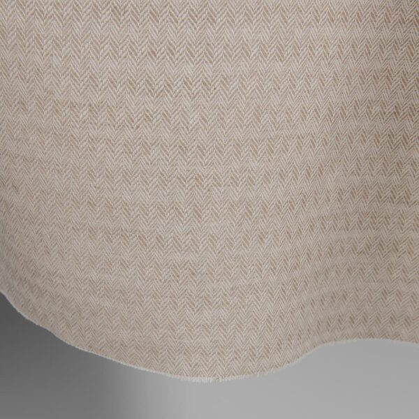 Brown and white linen cotton fabric in a herringbone pattern edge