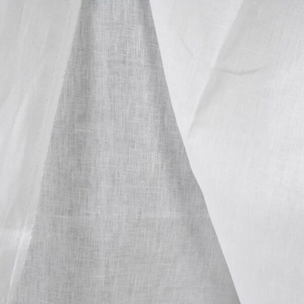 Heavy linen fabric bright white colour close up edge