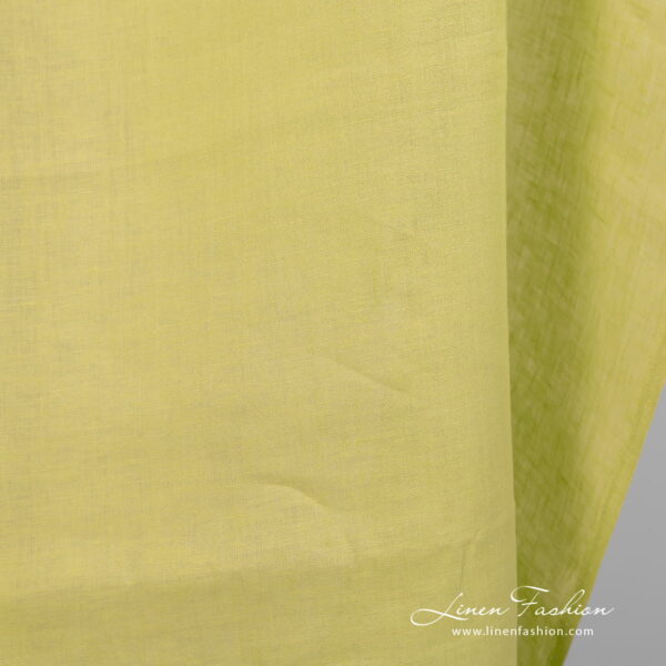 Linen fabric pale lime colour close up view