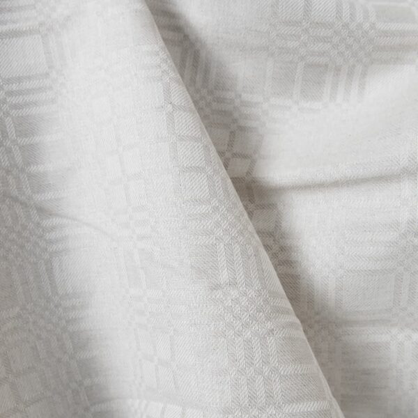 Linen cotton fabric in light beige checks detail view