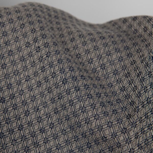 Linen cotton fabric blue and beige diamond pattern close up detail