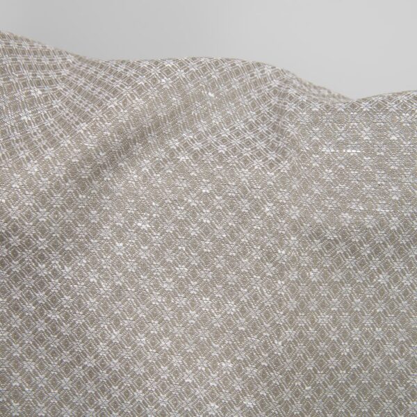 Linen cotton fabric dark beige and white diamonds close up detail
