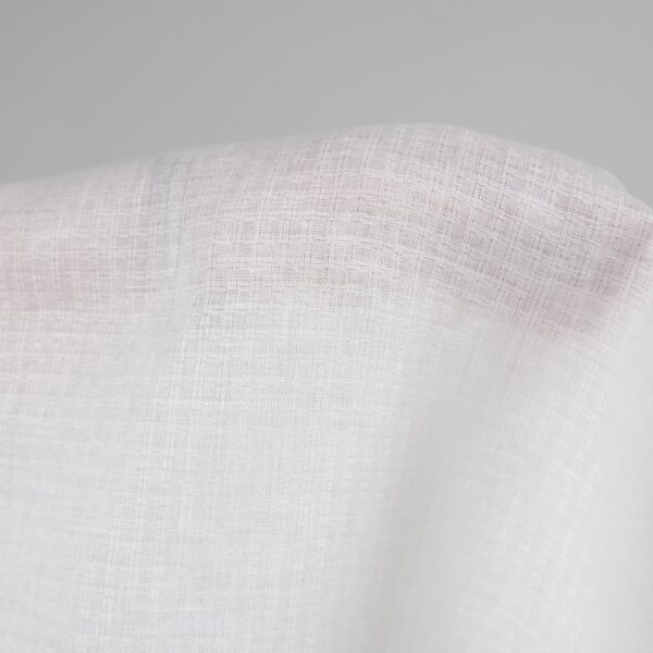 Linen fabric off-white colour patterned checks close up detail