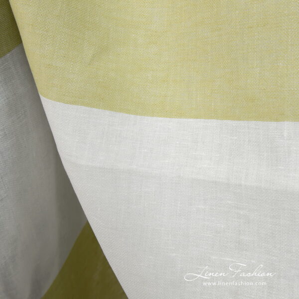 Linen fabric in green and off-white stripes close up detail