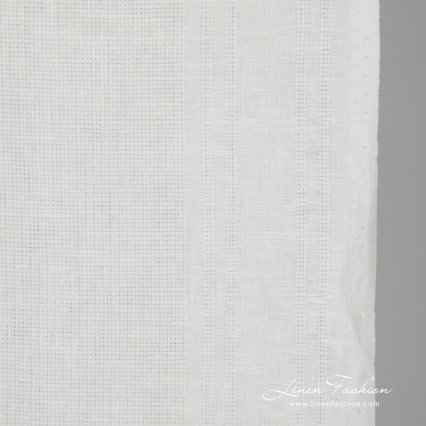 Narrow linen fabric white patterned close up detail
