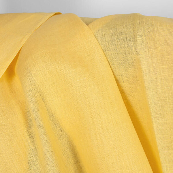Linen fabric in banana cream colour texture