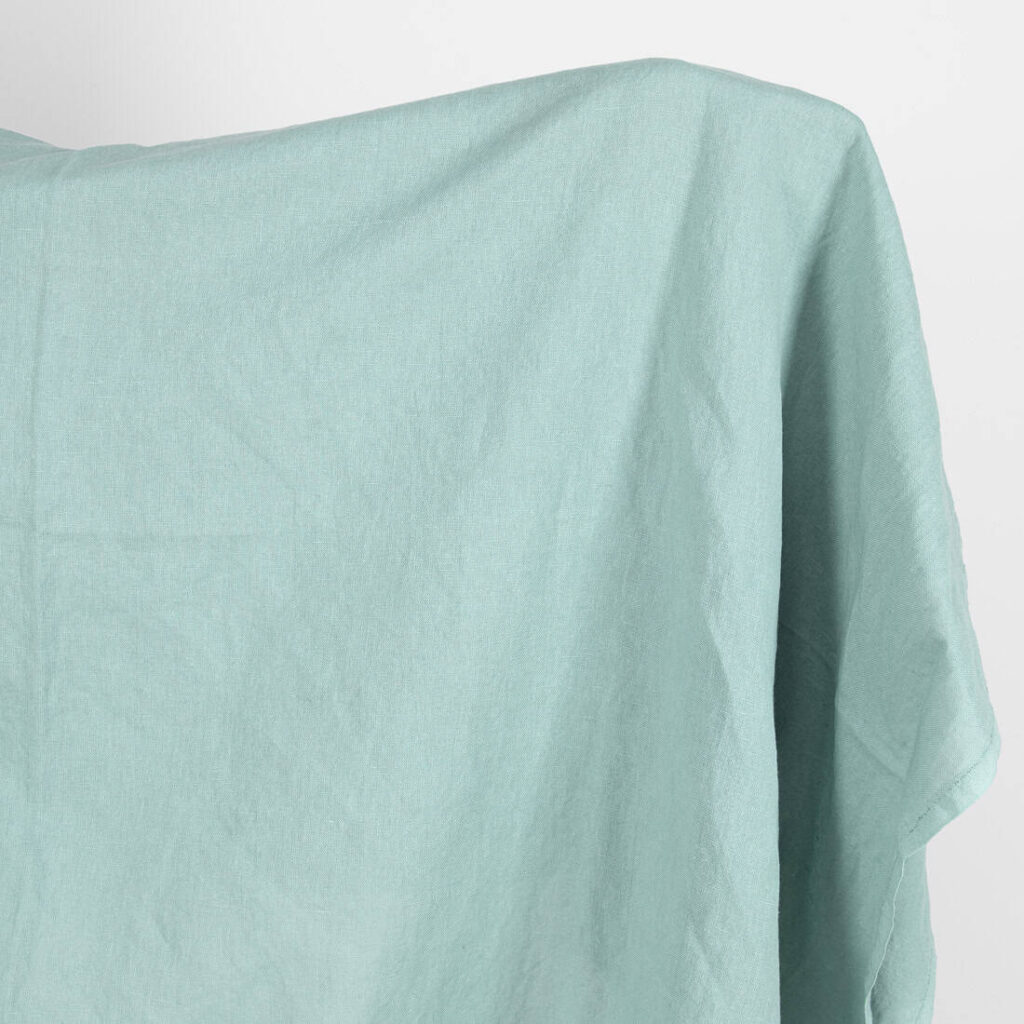 Linen cotton fabric in jadeite colour, washed