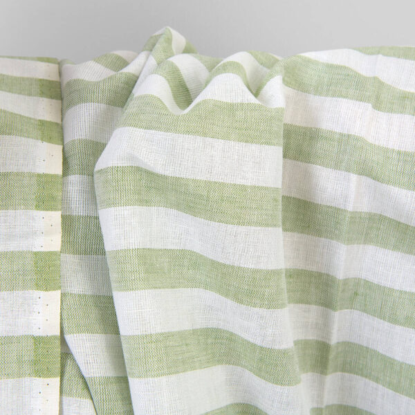Linen cotton fabric in green and white stripes, unwashed